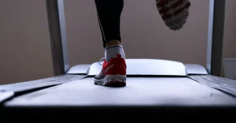 Close-up footage of man running on treadmill in sport gym Stock Footage 67330180