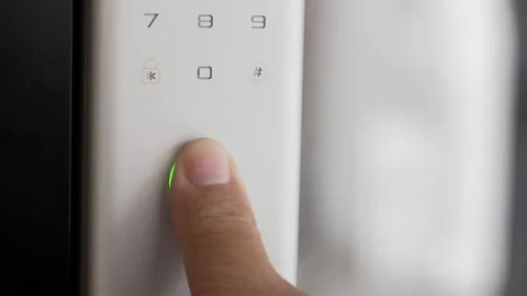 Close Up Footage of Man's hand opens the electronic digital door with a finger s Stock Footage 217657607