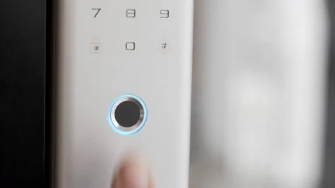 Close Up Footage of Man's hand opens the electronic digital door with a finger s Stock Footage 217657609