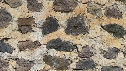 Close-up footage of an old rustic stone wall Stock Footage 331387126