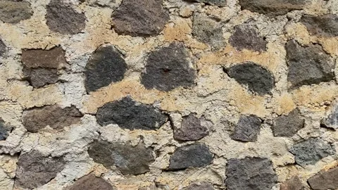 Close-up footage of an old rustic stone wall Stock Footage 331387463