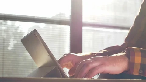 Close up footage of person working on tablet. Stock Footage 139105400
