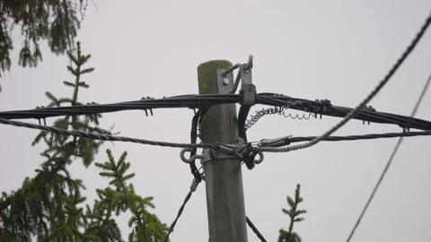 Close-up footage of rain falling on an electric pole Stock-Footage 223877265