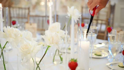 The close up footage of scene of served table with glasses, plates, and candles Stockbeeldmateriaal 322537790