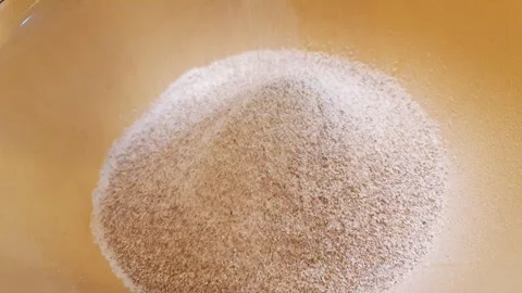 Close up footage of the sifted coarse rye flour. Baking Stock Footage 299650352