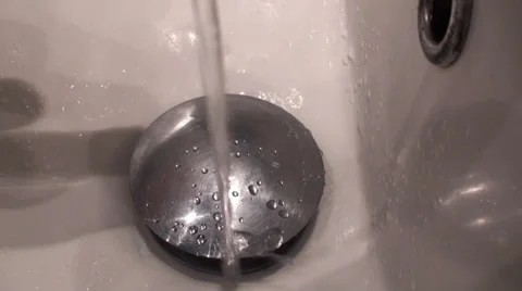 Close-Up Footage Of A Tap Opens And Water Starts To Flow In A Sink Stock Footage 35828081