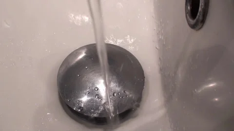 Close-Up Footage Of A Tap Opens And Water Starts To Flow In A Sink Stock Footage 35828106