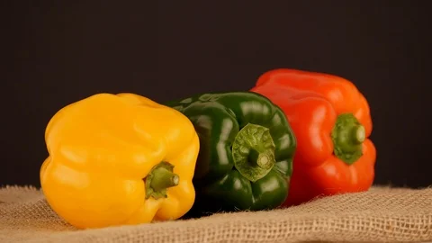 Close up footage of three paprika of different color Stock-Footage 103457169