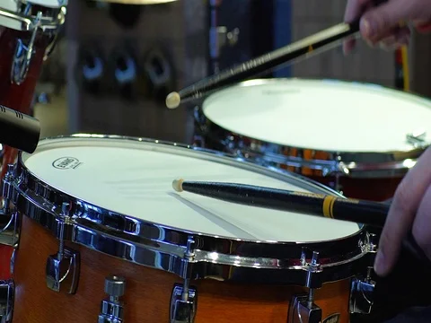Close up footage of two drum sticks hitting a snare drum, slowmotion 動画素材 73836191