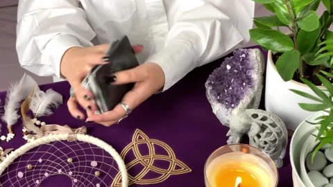 Close up footage of two hands shuffling and adjusting tarot cards Stock Footage 168326927