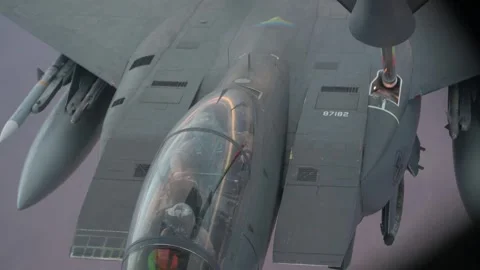 Close up footage of U.S. Air Force F-15E Strike Eagle aerial refueling Stock Footage 297066651
