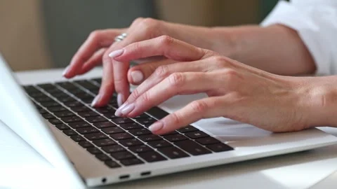 Close up footage of woman's hands typing on laptop keyboard. Study and work Stock Footage 302155795