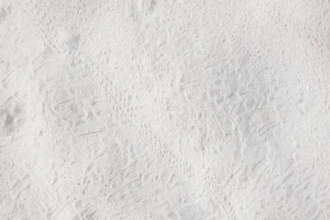 Close Up of Footprints in White Sand Stock Photos