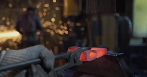 Close-up of forging an ax among sparks Video stock 144516987