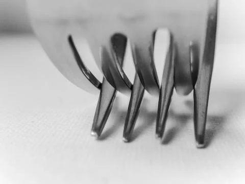 Close up of a fork with the letters A and D on it Stock Photos