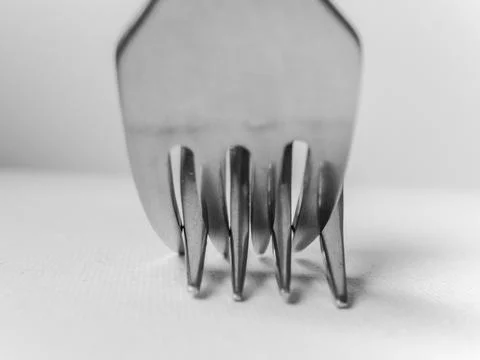 Close up of a fork with the letters A and D on it Stock Photos