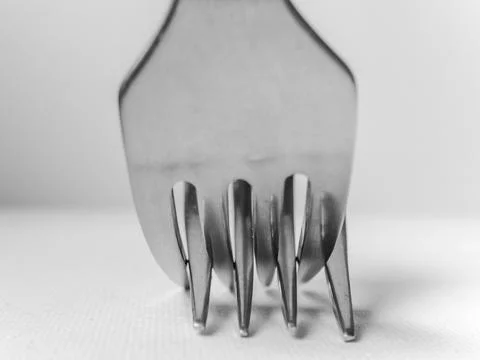 Close up of a fork with the letters A and D on it Stock Photos