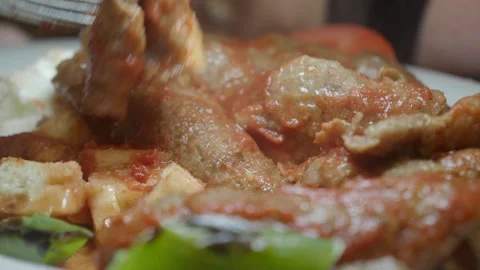 Close-up of Fork Picking Up Piece of Turkish Iskender Kebab Vídeos de archivo 339382314