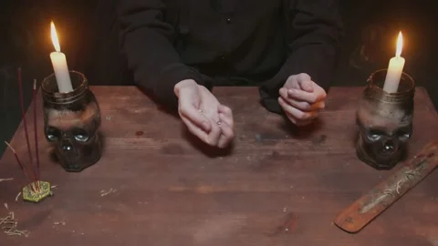 Close up of fortune teller tarot reader placing cards in order as mystic rite Video stock 145683254