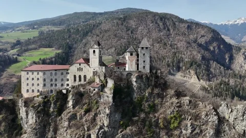 Close Forward Drone Flight Near Cliffside Monastery on Rocky Peak in Sou Vídeo Stock 335504095