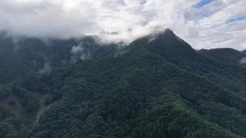 Close-Up Forward Drone Shot of Majestic Mountain Peaks and Mist, South Korea Stock Footage 345867533