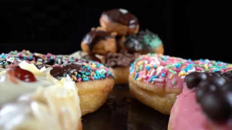 Close up forward macro footage of doughnuts, taken with laowa probe lens Stock Footage 150219560
