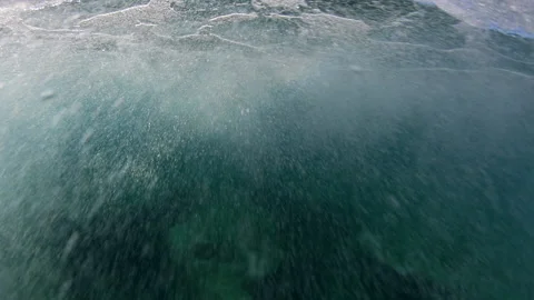 Close-Up Forward Shot Of Water Droplets Splashing Underwater - Oahu, Hawaii Stock Footage 154811147