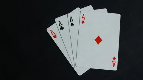 Close up, Four aces on black background. Space for text. Copy space. Casino.. Stock Photos