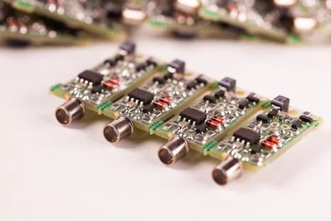 Close-up of four small microcircuits PCB Stock Photos