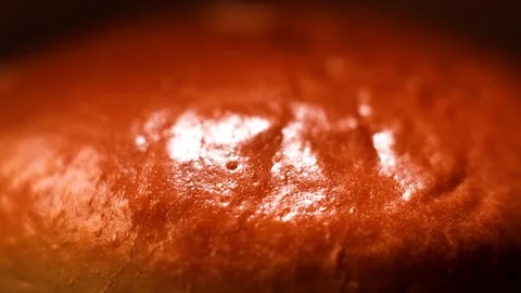 Close-up fragment of a burger bun texture. Stock footage. Macro of Burger bun Stock Footage 112816493