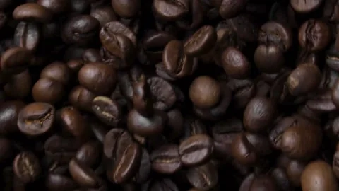 Close up of fragrant coffee beans are roasted smoke comes from coffee beans. Stock Footage 147875825