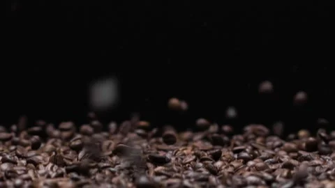 Close up of fragrant coffee beans are roasted smoke comes from coffee beans. Stock Footage 147875826