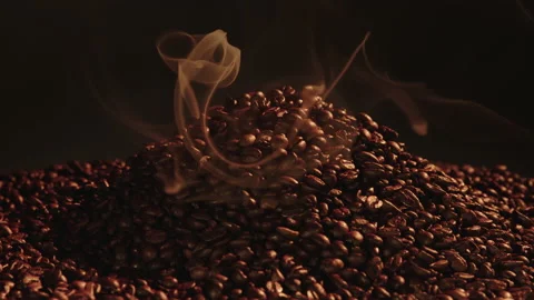 Close up in fragrant coffee beans smoking. Stock Footage 145274712