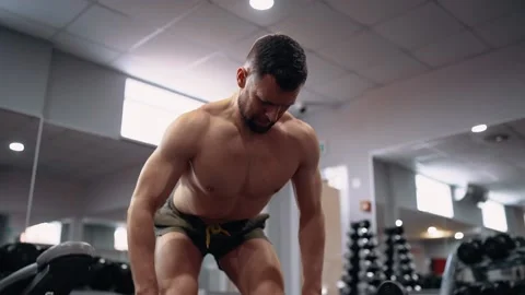 Close frame, in front, of the dedicated coach who demonstrates how to perform Video stock 156480881