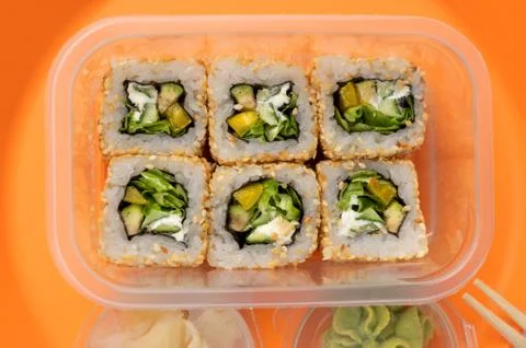 Close-up frame rolls in a plastic container Stock Photos