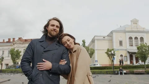 Close up frame of a sincere young couple standing in the middle of the square Vídeo Stock 197585227
