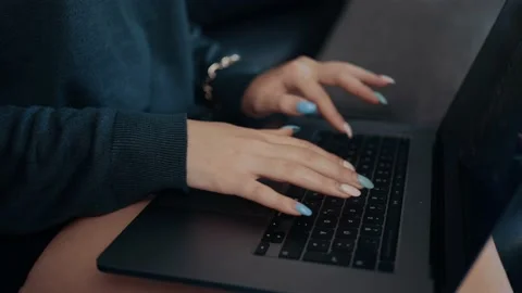 Close frame in slow motion of the hands of a businesswoman typing on the laptop Video stock 159482313