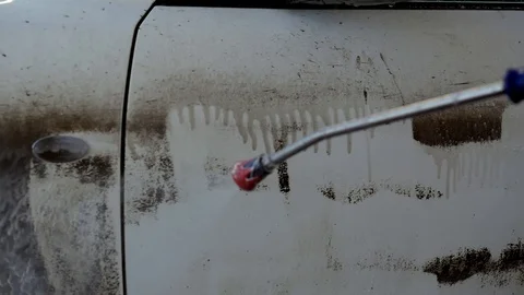 Close up frames of a car wash with special white foam for cleaning cars and Stock Footage 127443597