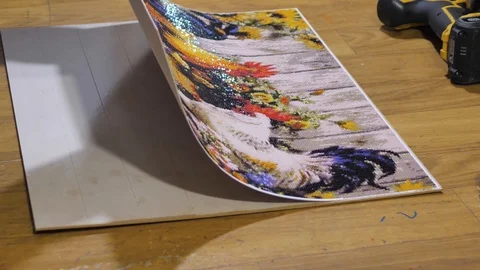 Close-up. Framing Workshop. A man makes a frame for a picture made of beads 스톡 동영상 128740100