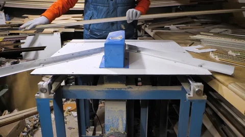 Close-up. Framing Workshop. wood rail cutting machine for baguette frame Stock Footage 128738285