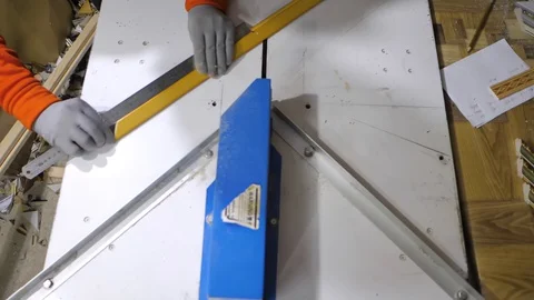 Close-up. Framing Workshop. wood rail cutting machine for baguette frame Stock Footage 128738339