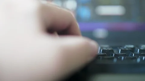 Close up of freelance hand working on backlit keyboard on video editing software Stock-Footage 102177727