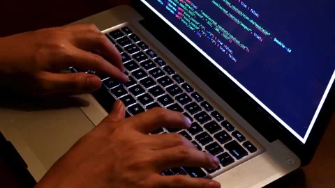 Close up of freelancer hands typing app using digital laptop computer. typing a Vídeos de archivo 334585908