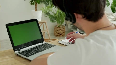 Close-up freelancer male hands using green screen chroma key laptop typing Stock-Footage 149739159