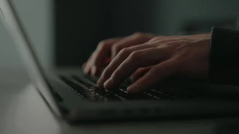 Close-up of freelancer male remote working from home office, developing software 動画素材 305504346