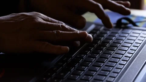 Close up of freelancer typing program code on laptop keyboard in coworking. Stock-Footage 277848057