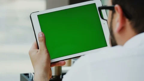 Close-up of freelancer work on touchscreen pad indoor Stock Footage 112990642