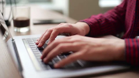 Close up of freelancer's developer hands typing program code on laptop keyboard Stock Footage 218006220