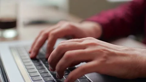 Close up of freelancer's developer hands typing program code on laptop keyboard Stock Footage 220072831