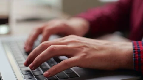 Close up of freelancer's developer hands typing program code on laptop keyboard Stock Footage 220725247